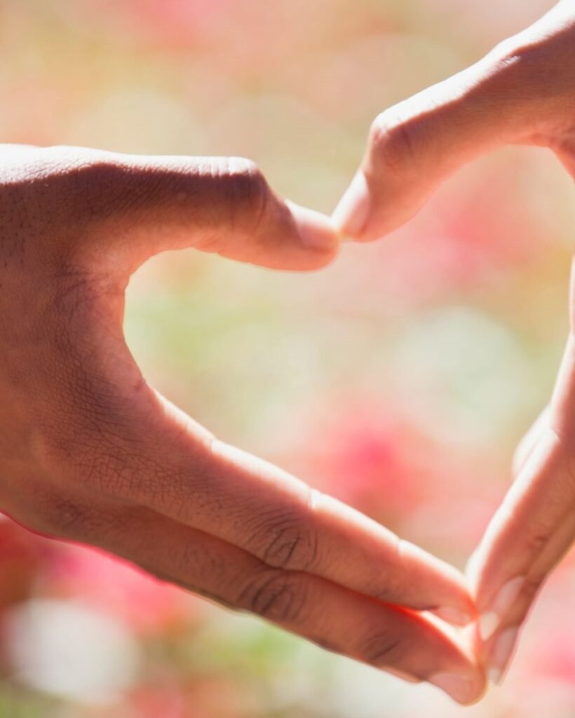two hands forming a heart