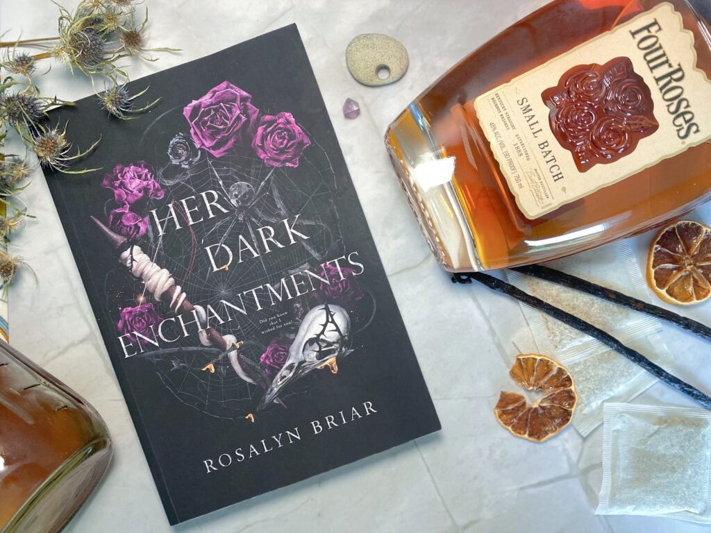 Her Dark Enchantments paired with cocktail ingredients