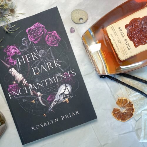 Her Dark Enchantments paired with cocktail ingredients